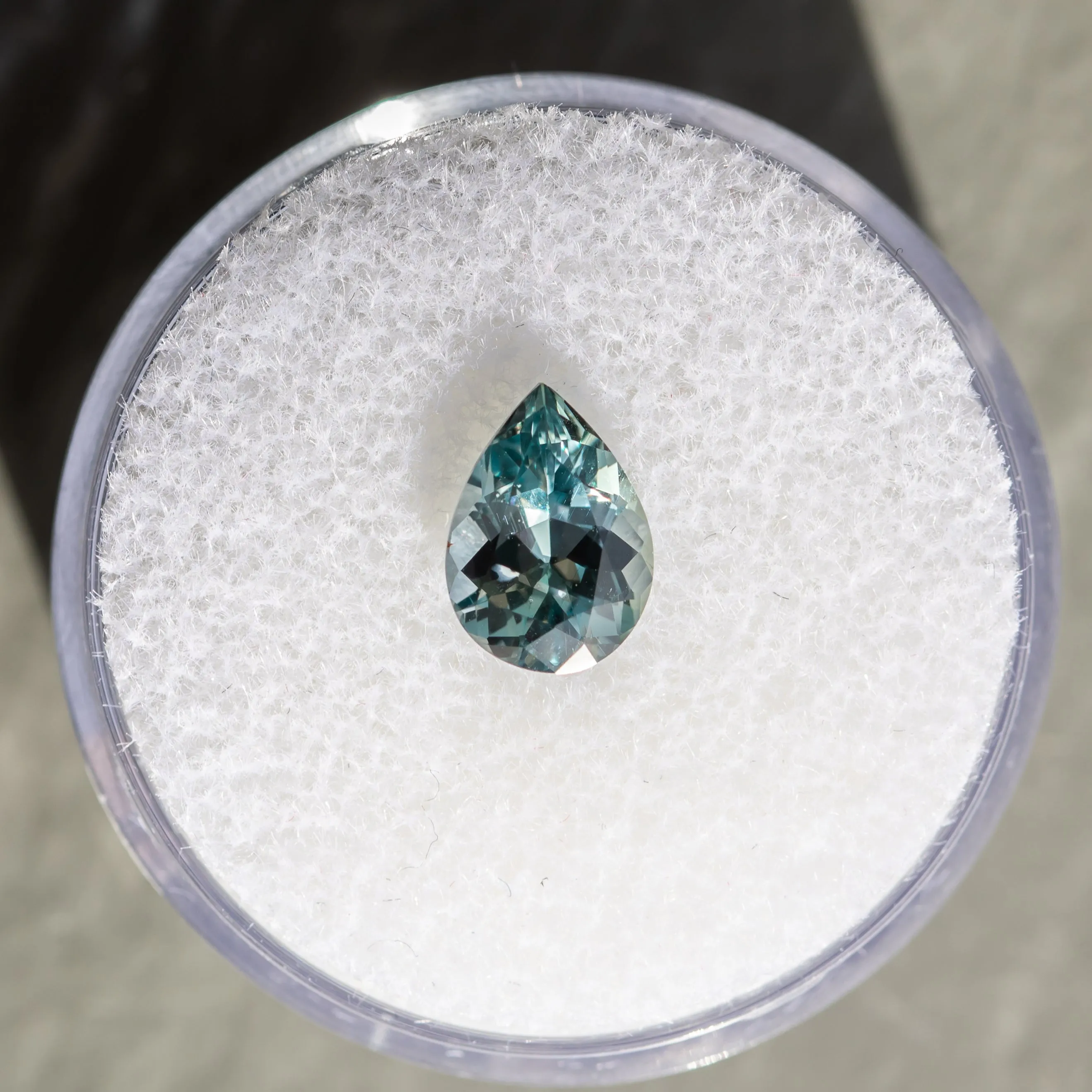 1.50CT PEAR MOZAMBIQUE SAPPHIRE, COLOR-SHIFTING MINTY GREEN TO TEAL BLUE GREY, 8.60x6.20x398MM, UNHEATED